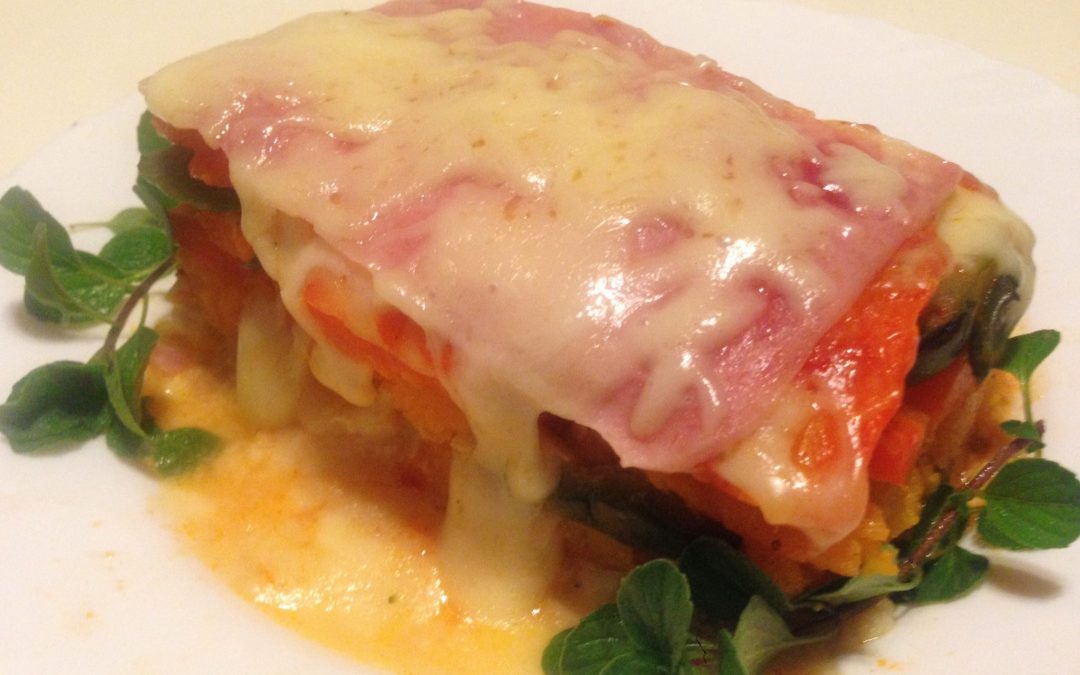 Lasagna vegetal con jamón y queso